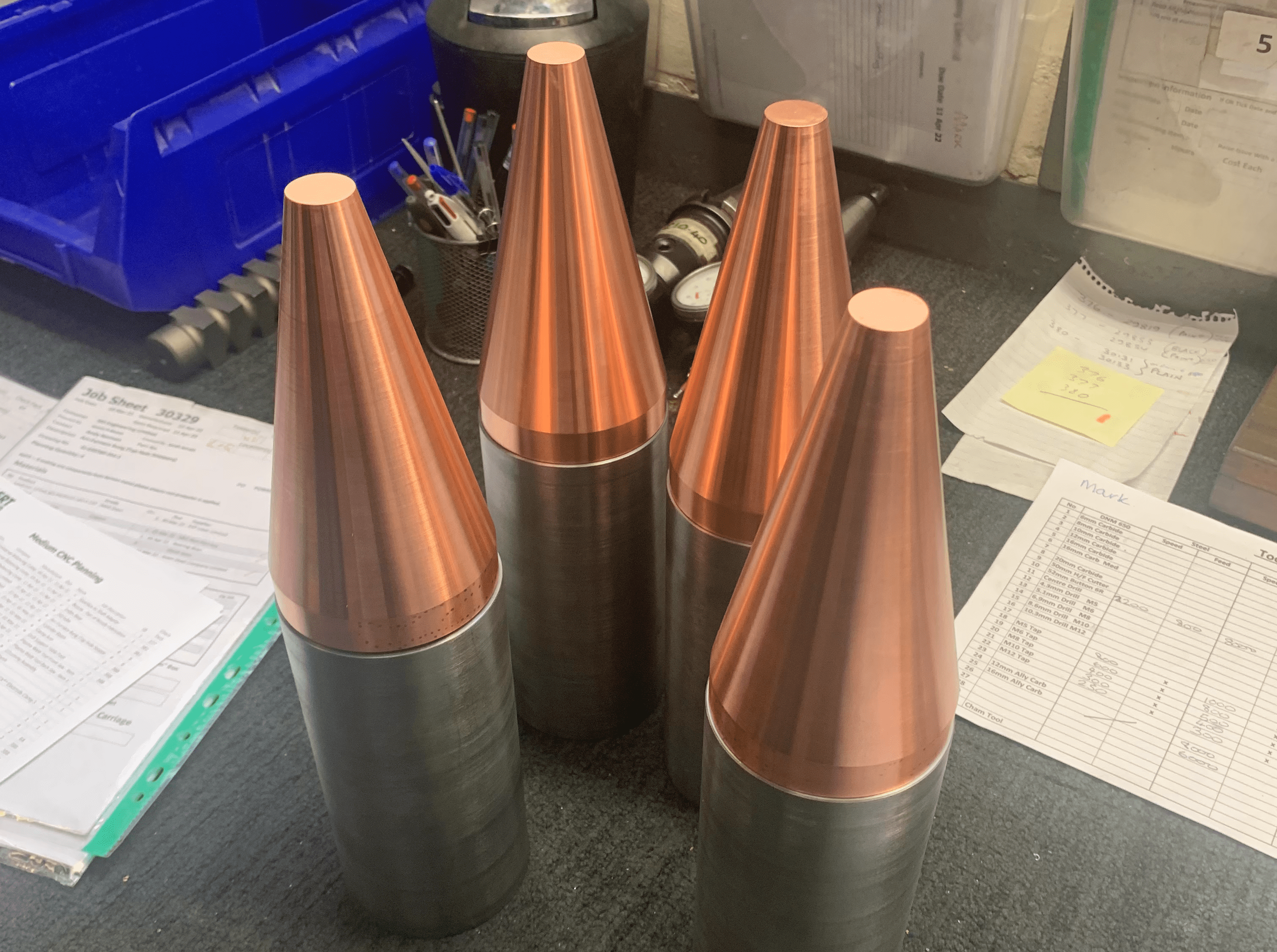 Precision-machined cylindrical parts which were made with CNC turning services.